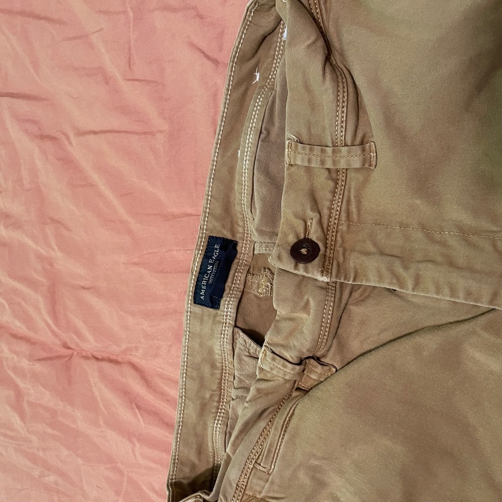 American Eagle extreme flex tan in color